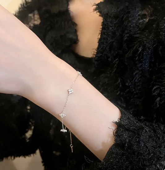 White Gold-Plated Four Leaf Clover & Star Charm Bracelet – Cubic Zirconia Accents