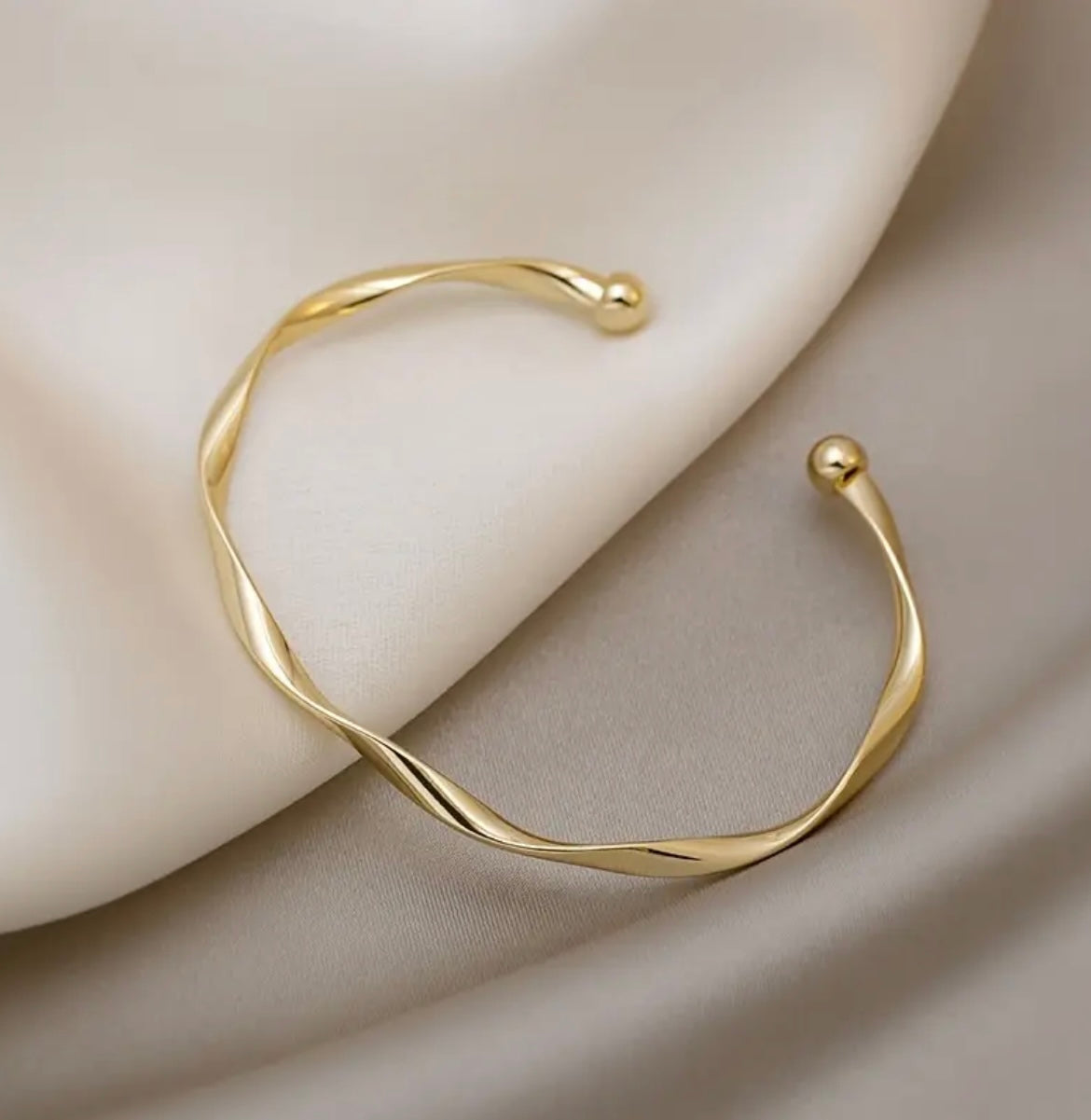 Elegant Twisted Knot Cuff Bracelet