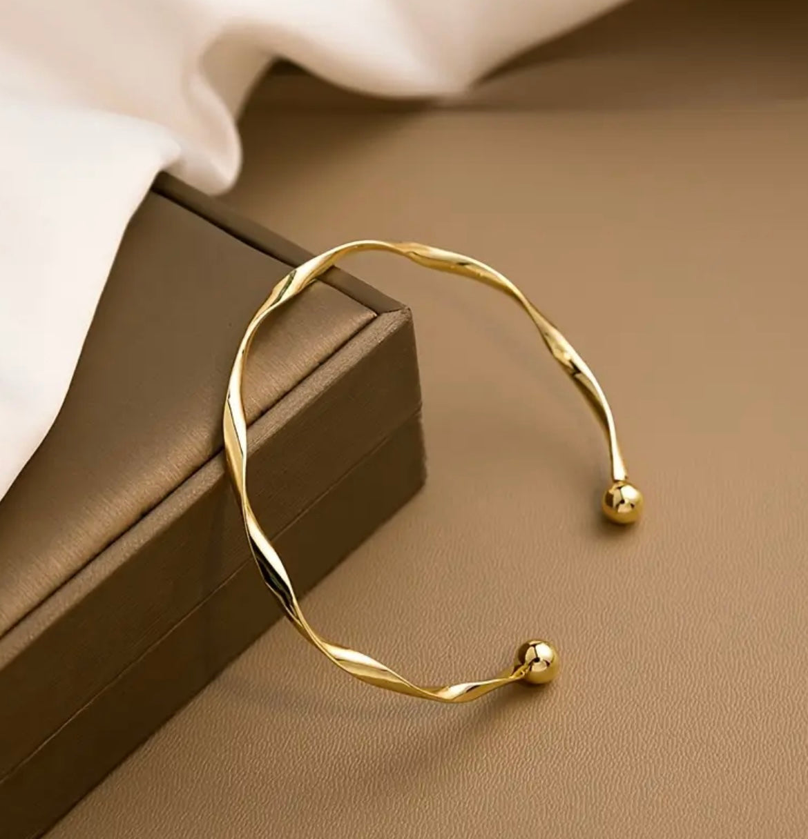 Elegant Twisted Knot Cuff Bracelet